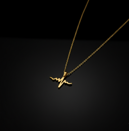 Pulse of Gold – Heartbeat Pendant Necklace  Stainless Steel
