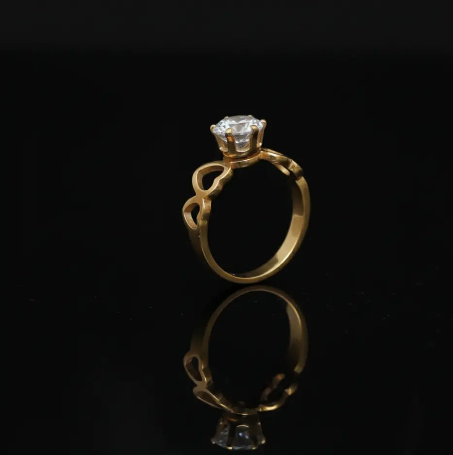 Gold Toned Solitaire Ring with Heart Detail Band