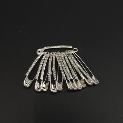 Decorative safety pin with rhinestones