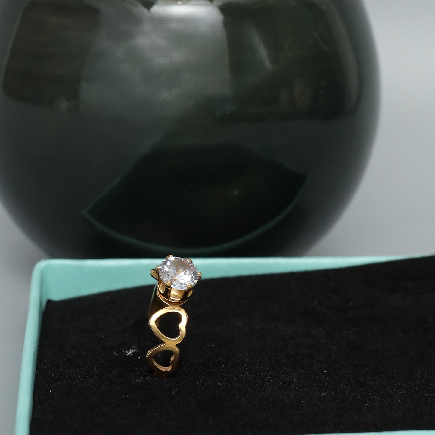 Gold Toned Solitaire Ring with Heart Detail Band  Stainless Steel